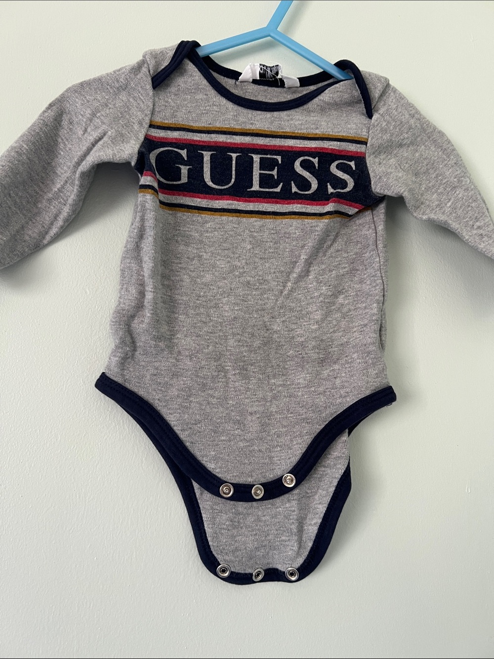 GUESS Grey Long-Sleeve Bodysuit with Navy Trim and Red/Yellow Stripe Logo